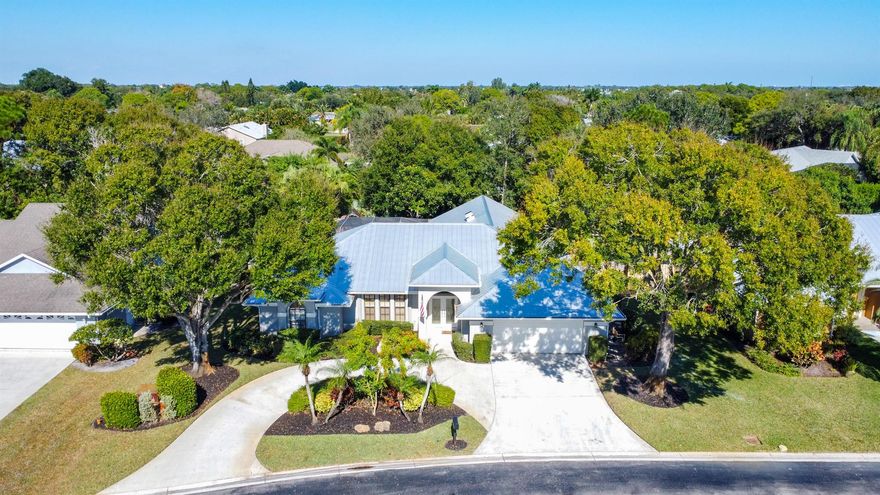 Exquisite 4 bedroom, 2.5 bath Palm City residence showcasing a fully renovated gourmet kitchen with an oversized island, double ovens, walk-in pantry, and impeccable designer finishes--every detail curated with intention. Elegant upgraded bathrooms, a brand-new roof, and a stunning screened-in pool complete with a cabana bath and outdoor shower create a seamless blend of comfort and sophistication. The beautifully landscaped backyard offers a private retreat ideal for refined family living. Located in Hunters Creek, a gated community with low HOA fees and minimal restrictions, this home delivers luxury and convenience in one.