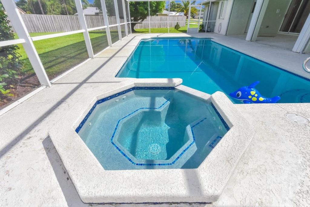 Photo of 3041 SE Dalhart Road, Port Saint Lucie, FL 34952 (MLS # R11130155)