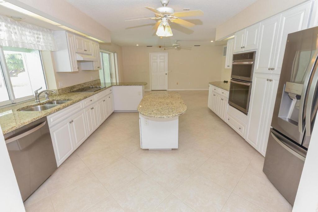 Photo of 3041 SE Dalhart Road, Port Saint Lucie, FL 34952 (MLS # R11130155)