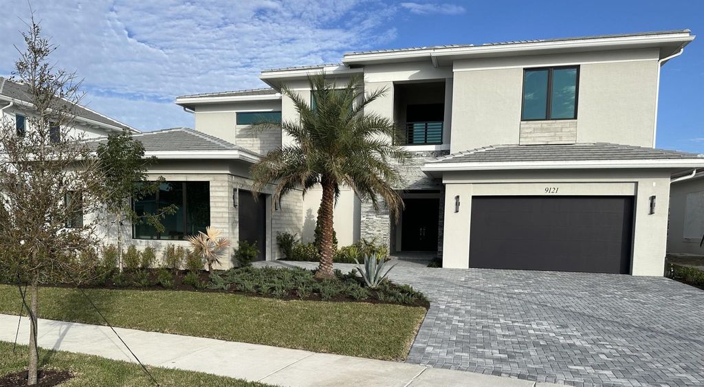 Photo of 9121 Coral Isles Circle #{Lot 83}, Palm Beach Gardens, FL 33412 (MLS # R11051390)