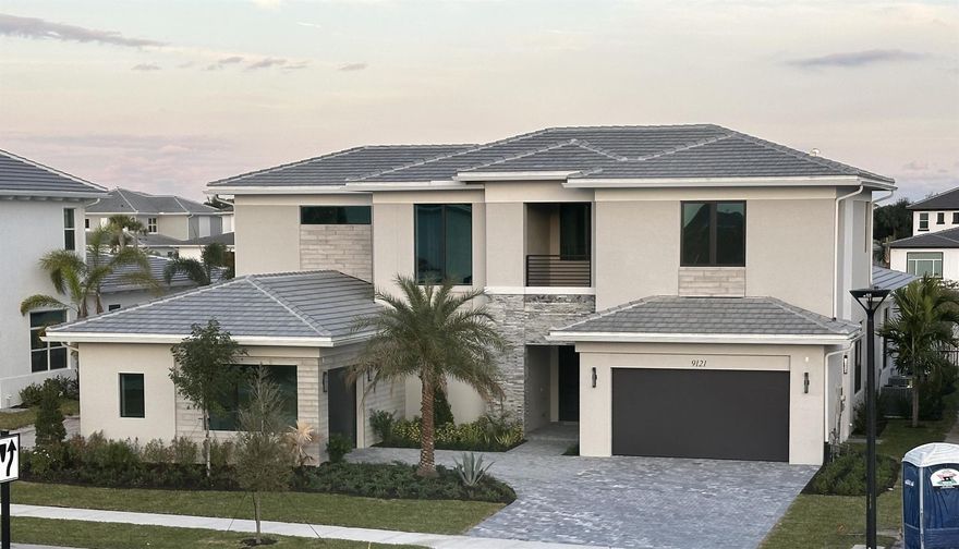 MAGNIFICENTLY APPOINTED NEW CONSTRUCTION ESTATE HOME IN PALM BEACH GARDENS' NEWEST MASTER-PLANNED COMMUNITY! HIGHLY DESIRABLE 2-STORY COZUMEL GRANDE FEATURES MASTER SUITE AND GUEST ROOM ON 1st FLOOR, DRAMATIC 12-FOOT CEILINGS, GRAND 10' SLIDING GLASS DOORS, LOW-E IMPACT GLASS, LOADS OF STUNNING HIGH-END LUXURY FINISHES. METICULOUS ATTENTION TO DETAIL BY ACCLAIMED PALM BEACH COUNTY PRIVATE LUXURY BOUTIQUE HOME BUILDER WITH 30-YEAR HISTORY! GORGEOUS POOL|SPA WITH MARBLE DECK AND SET ON SERENE WATERWAY. MODERN LUXURY IN THIS GORGEOUS HOME AND SURROUNDING COMMUNITY WITH RESORT STYLE CLUBHOUSE ALREADY DONE RIGHT NEXT DOOR. GET IN EARLY AND BE PART OF AVENIR'S HISTORY! NOTHING COMPARES TO A KENCO BUILT HOME!