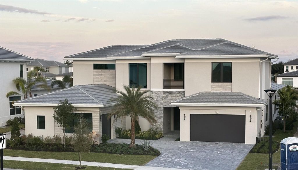Photo of 9121 Coral Isles Circle #{Lot 83}, Palm Beach Gardens, FL 33412 (MLS # R11051390)