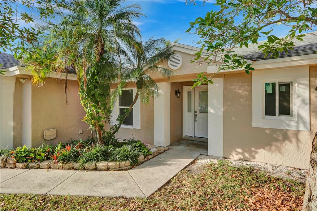 Fully renovated 3 Bed and 2 Bath home!! Step inside and fall in love with the layout featuring a split bedroom floorplan. This “like-new” home has an abundance of natural light and vaulted ceilings, creating a bright and airy feel. The NEW kitchen is complete w/ Samsung appliances and stylish finishes. Enjoy the Florida sun in your very spacious, privately fenced backyard with newly installed turf, providing easy yard maintenance. This home is move-in ready and features new roof (2017), brand new water heater (2023), newer AC (2018), impact windows and doors, WIFI controlled garage door, all new flooring, new electric switches/fixtures, new paint & new plumbing. Move in with complete peace of mind! **Located just a short walk to Sandpiper Elementary School