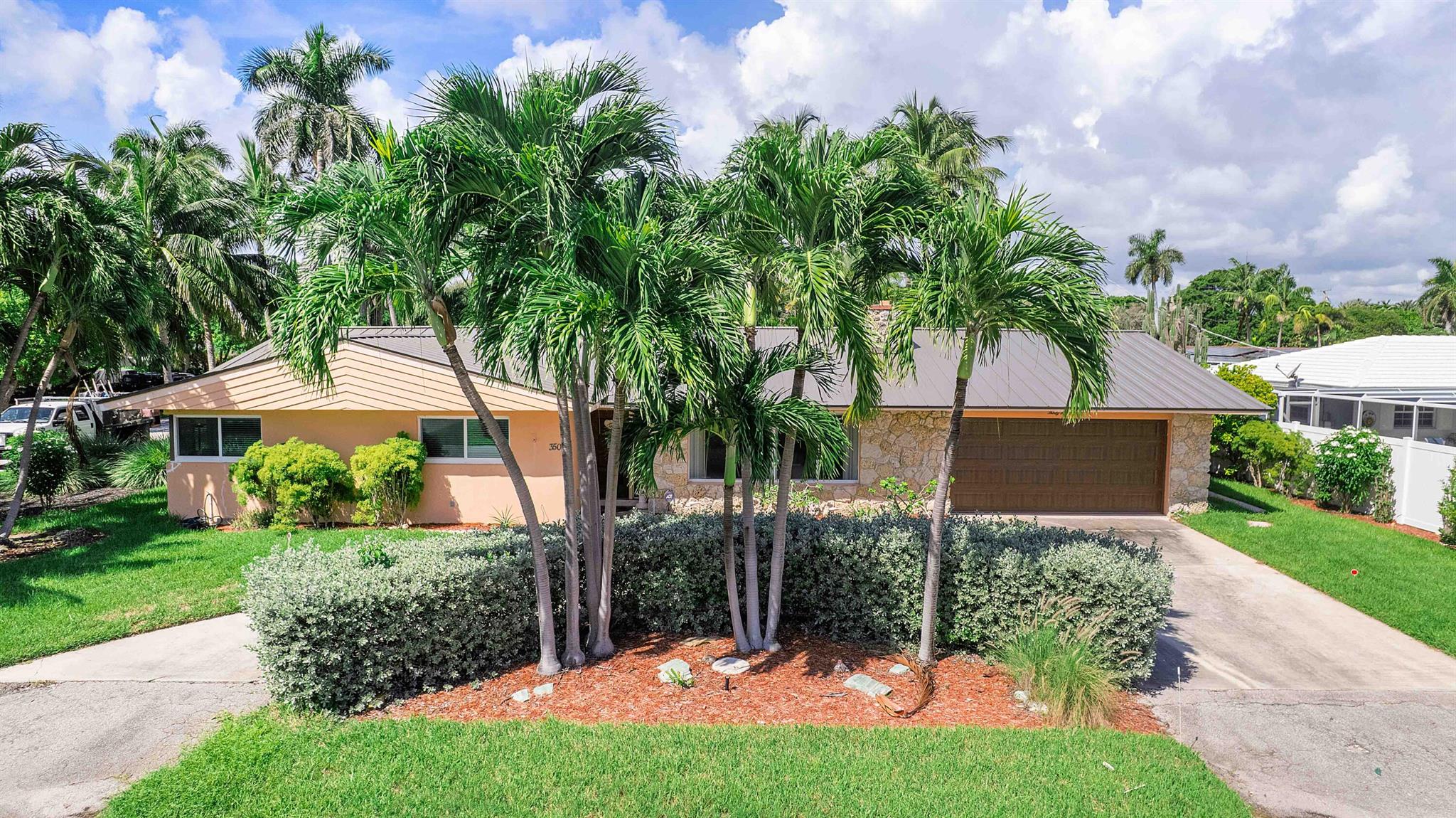 LOCATION, LOCATION, LOCATION!!! Excellent Opportunity to own in sought after island neighborhood of Lake Placid in Lighthouse Point! Original mid-century charm waiting for your modern touch. NEWER ROOF, A/Cs &HURRICANE WINDOWS!! 3BD/2.5BA w/legal 1BD/1BA in-law suite w/separate entrance. 1 BLOCK to Frank McDonough park & LHP Tennis Center. 5 min drive to new Publix grocery & shops @US1 & Sample Rd. 7 Mins to I-95.11 mins to Turnpike.