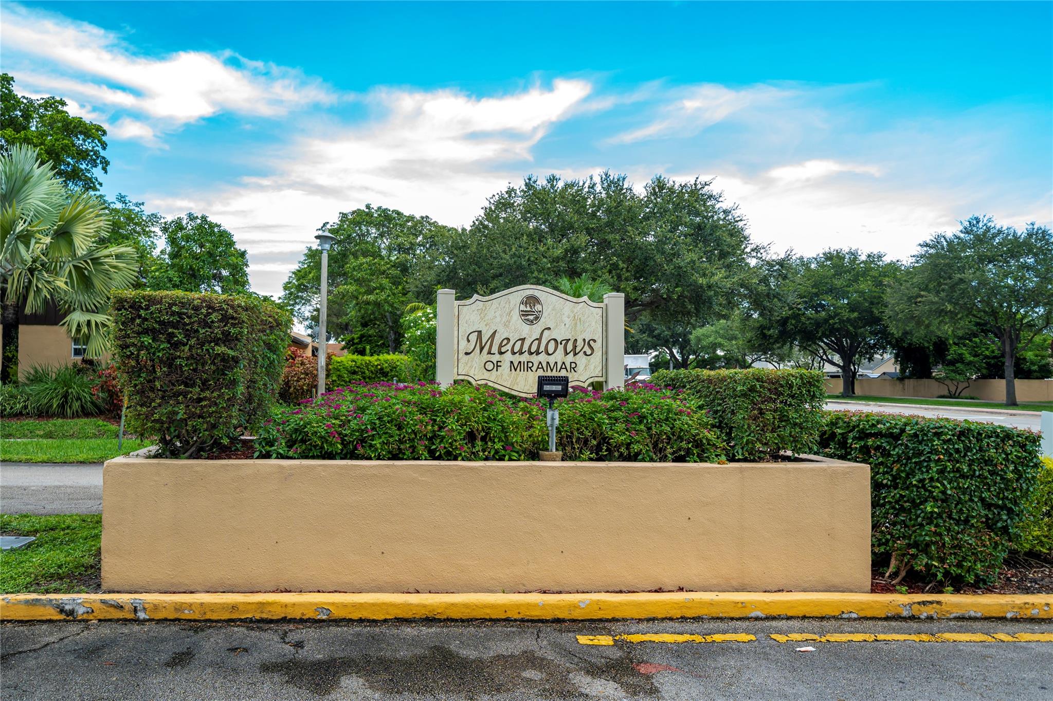 Welcome to your dream villa in The Meadows of Miramar! This charming corner unit 3-bedroom, 2-bath property is perfect for anyone seeking a blend of comfort and convenience. As you step inside, you'll be greeted by an inviting living space, highlighted by wide sliding glass doors that flood the room with natural light & offer stunning views of your private yard. The oversized 1-car garage complete with a convenient door leading directly to the back of the unit, making access a breeze. This villa presents a fantastic opportunity for you to personalize and upgrade to your taste, creating a home that truly reflects your style Located in a prime area, just moments away from restaurants, malls, & major highways.. Incredible opportunity to own a property in such a desirable location!