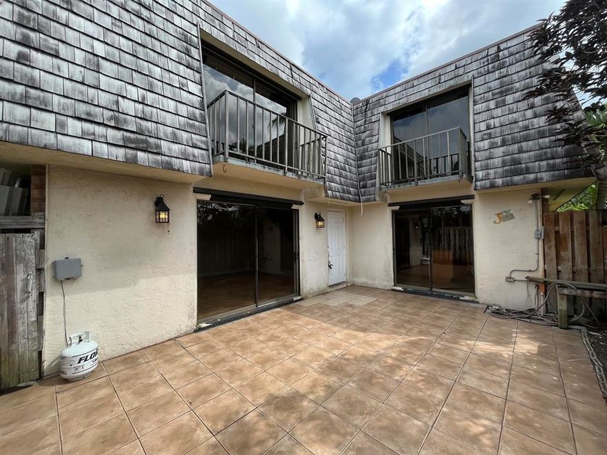 1st Floor has Travertine flooring throughout living area, Full bath and laundry room downstairs. 2nd Flor has carpet approx 2 years old.  Large size bedrooms and full bath upstairs.