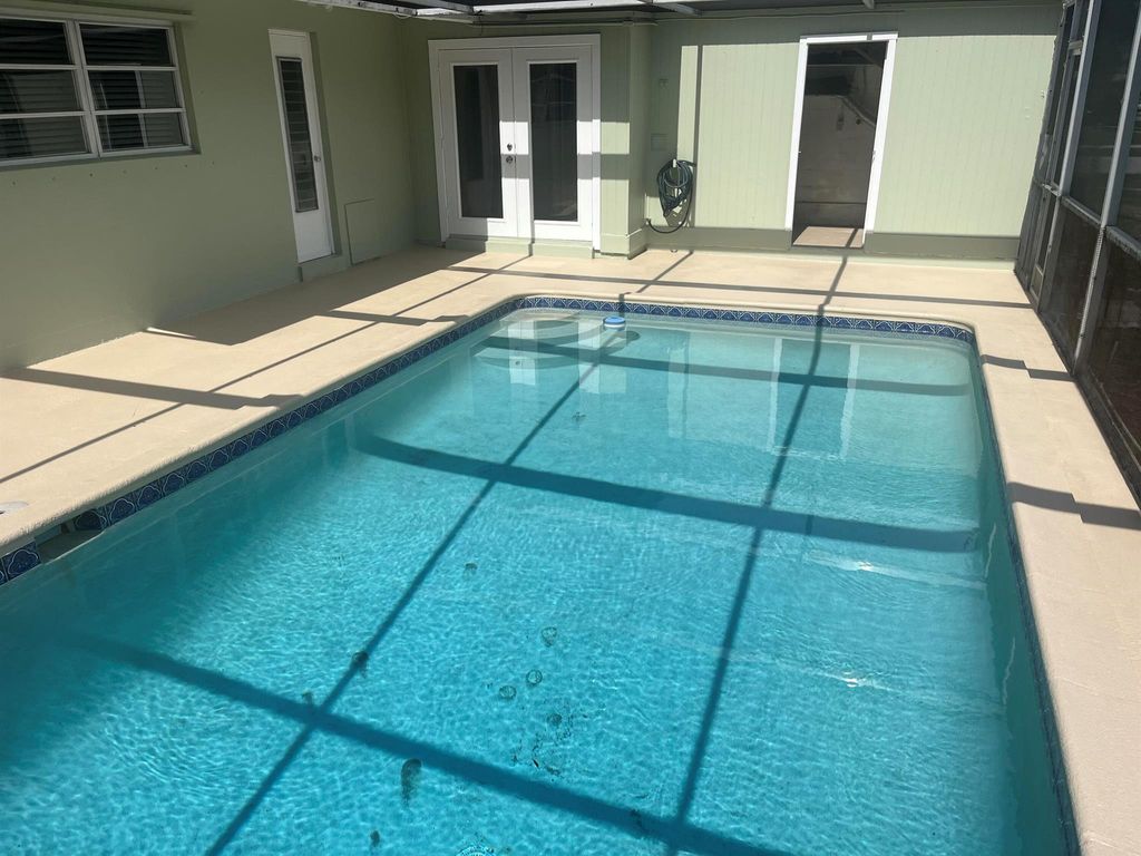 Photo of 9109 Bamboo Drive, Palm Beach Gardens, FL 33410 (MLS # R11104509)