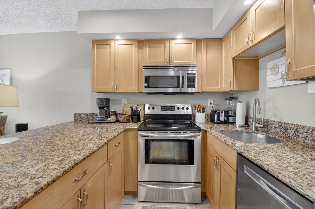 Photo of 451 Greensward Lane #104-B, Delray Beach, FL 33445 (MLS # B26075420)