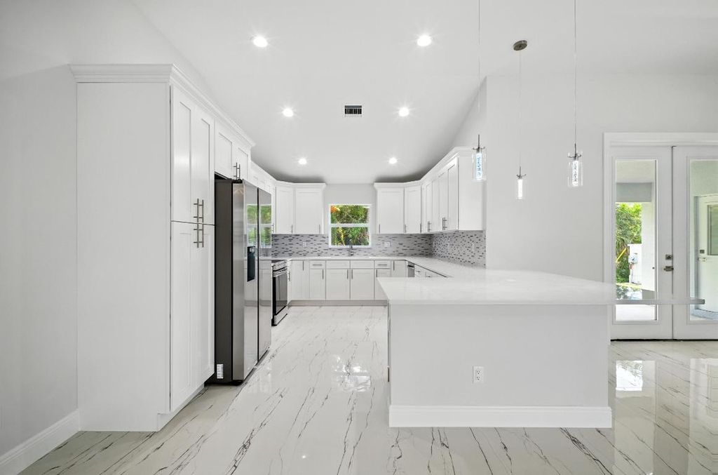 Photo of 2624 Newport Drive, Fort Pierce, FL 34982 (MLS # R11106559)