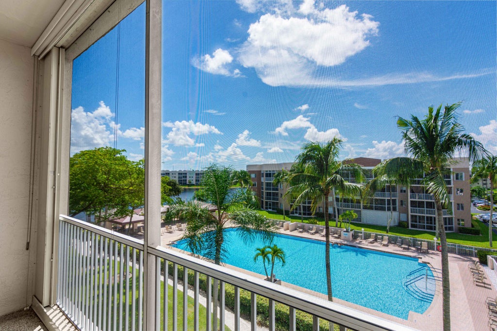 Photo of 7694 Granville Drive #412E, Tamarac, FL 33321 (MLS # B26077258)