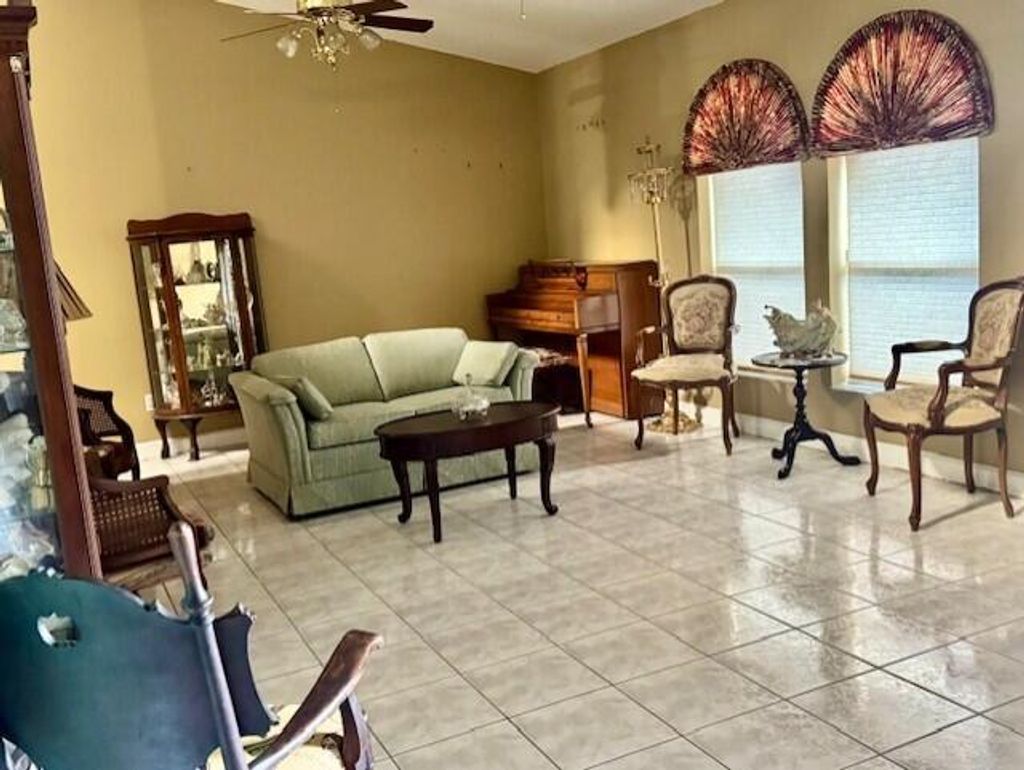 Photo of 1902 SE Dranson Circle, Port Saint Lucie, FL 34952 (MLS # R11083119)