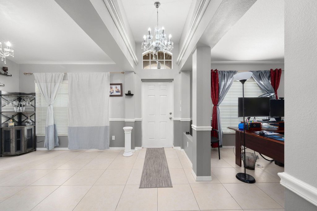 Photo of 4215 SW Bachman Street, Port Saint Lucie, FL 34953 (MLS # R11144070)