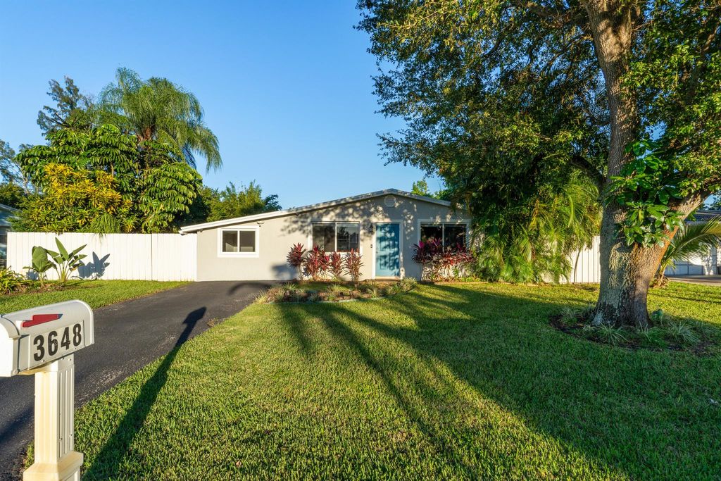 Photo of 3648 Laurette Lane, Lake Worth Beach, FL 33461 (MLS # R10929544)