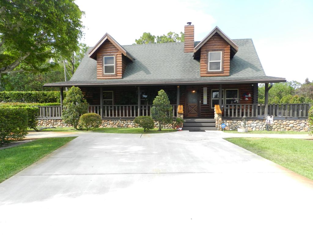 Photo of 4032 122nd Drive N, The Acreage, FL 33411 (MLS # R10991369)