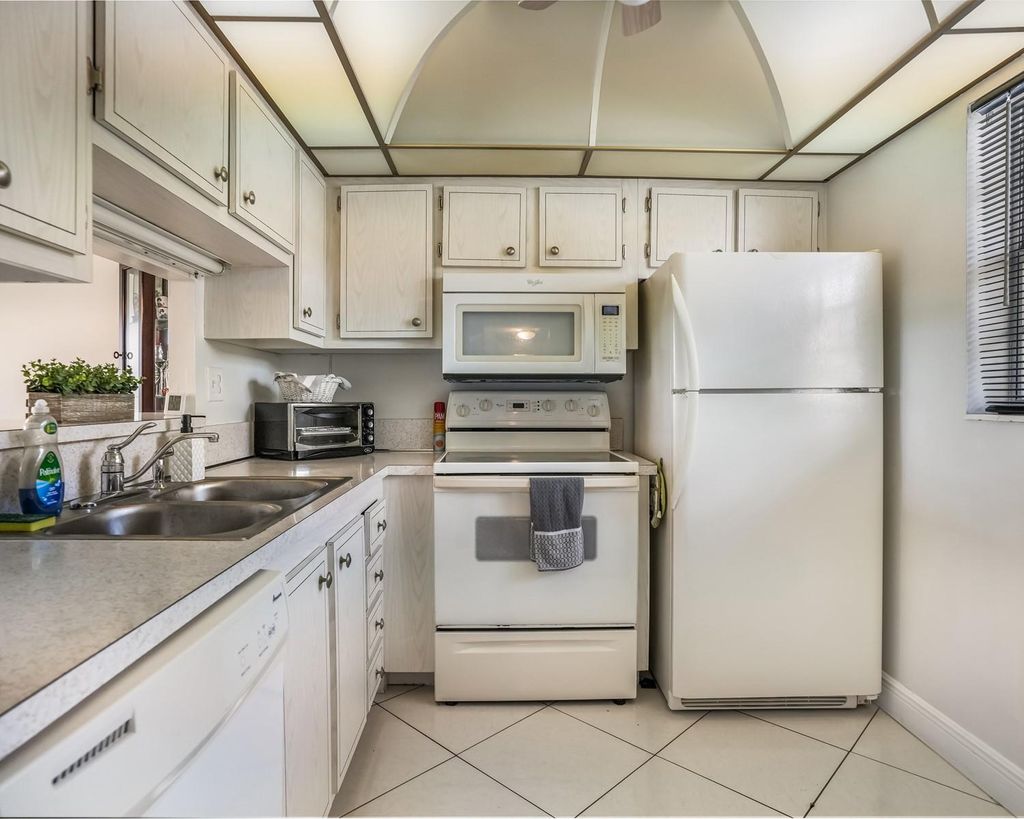 Photo of 4705 NW 35th St #411, Lauderdale Lakes, FL 33319 (MLS # F10528774)