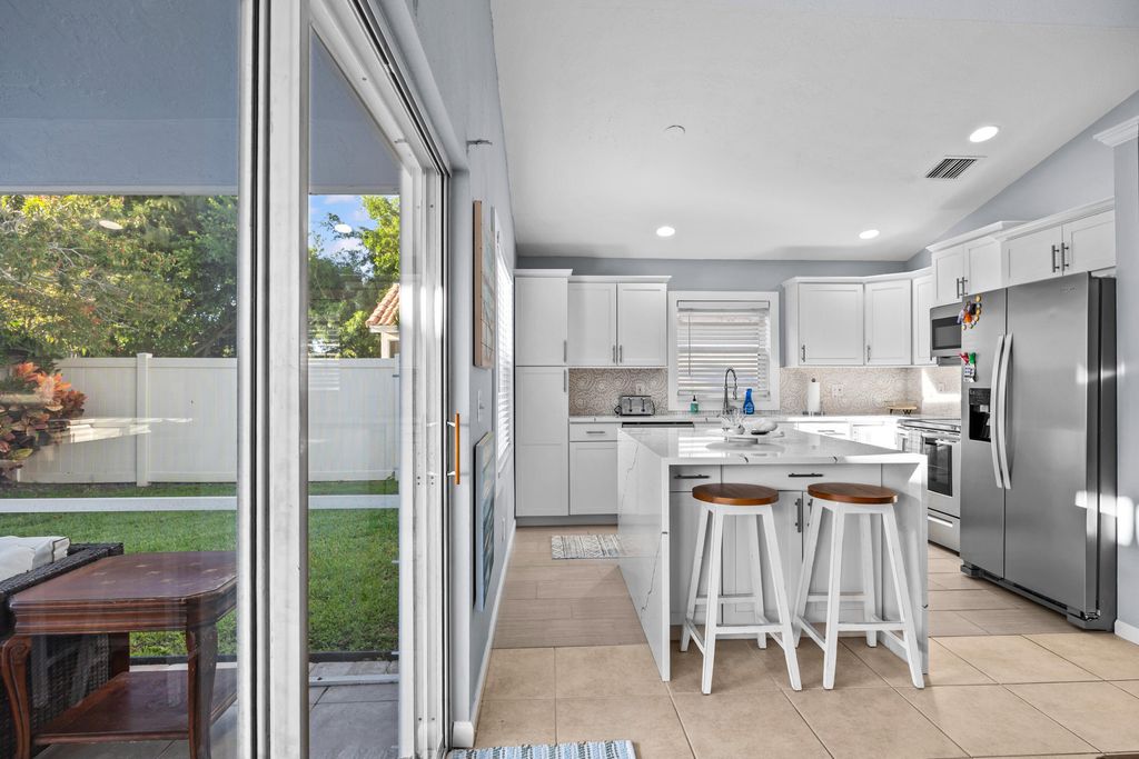 Photo of 1664 Carriage Brooke Drive, Wellington, FL 33414 (MLS # B26018364)