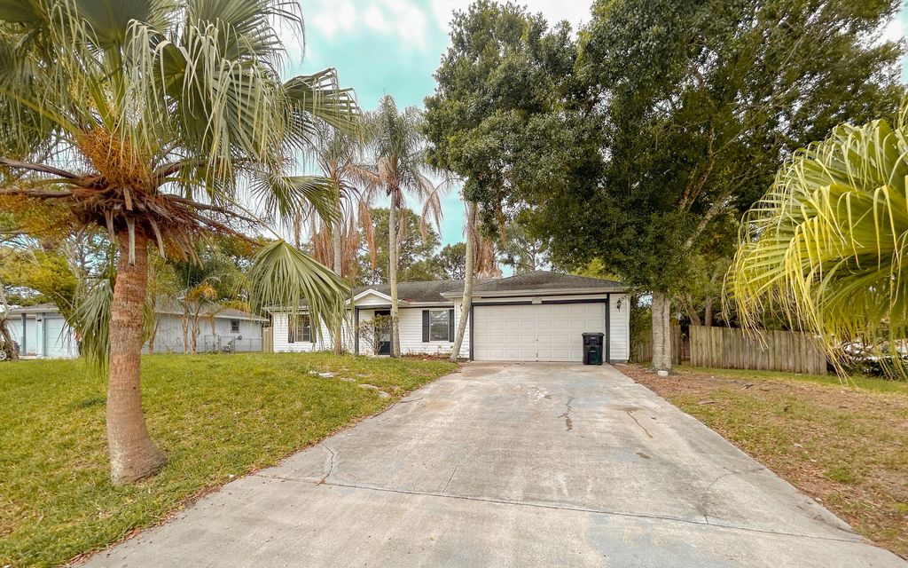Photo of 1898 SW Lofgren Avenue, Port Saint Lucie, FL 34953 (MLS # B26009704)