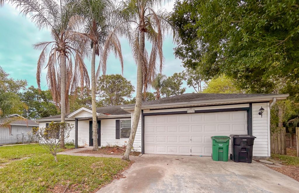 Photo of 1898 SW Lofgren Avenue, Port Saint Lucie, FL 34953 (MLS # B26009704)