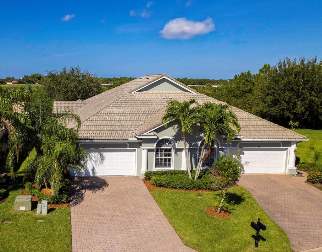 Photo of 511 NW Red Pine Way, Jensen Beach, FL 34957 (MLS # R11075537)