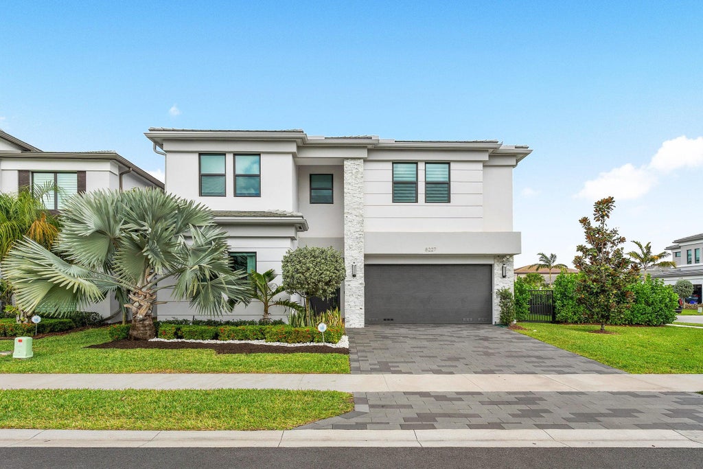 Photo of 8227 OCEANUS Drive, Boca Raton, FL 33496 (MLS # B26088972)