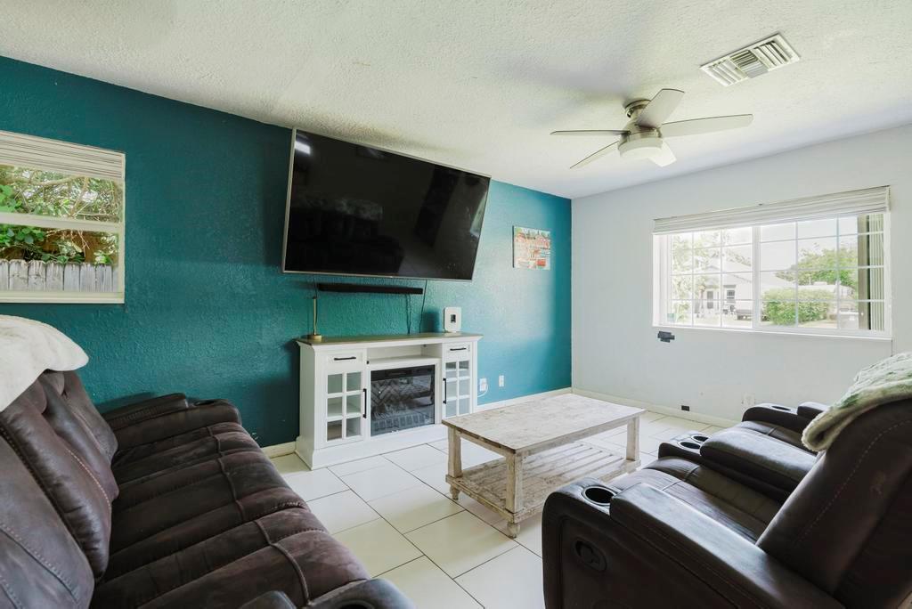 NO HOA! Enjoy true freedom in this beautifully maintained 3 bed, 2 bath Single Family Home with no restrictions and no extra fees. Bring your boat, park your vehicles, and make it your own without limitations! Inside, you'll find stainless steel appliances and a brand-new 2024 A/C. The newly fenced backyard is perfect for entertaining, featuring a screened-in patio and a utility shed for added storage. Located in a prime central area, close to everything Palm Beach County has to offer. Homes like this don't last--schedule your showing today!