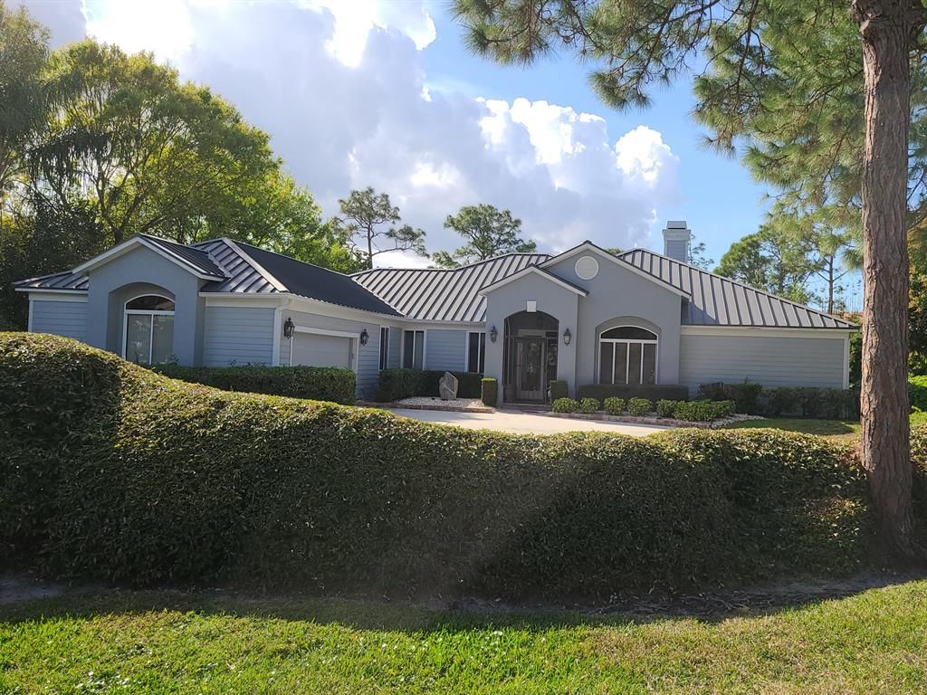Photo of 11101 Lands End Chase, Port Saint Lucie, FL 34986 (MLS # R10769598)