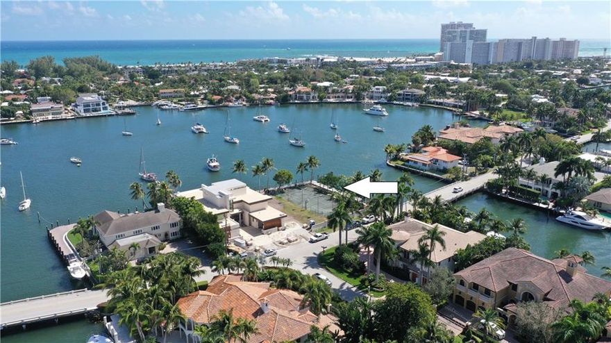 Amazing wide open Lake Sylvan views (opens to intracoastal) from trophy point lot. Highly desirable East exposure offers mesmerizing views & tropical breezes. Substantial sea wall with wide cap & multiple power pedestals. Dimensions: 100x143x100x129 total of 13,609 sq ft.Potential 229ft +/- dockage for large or multiple yachts.One of  few vacant/buildable point lots available in Harbor Beach offering a private marina & surf club.