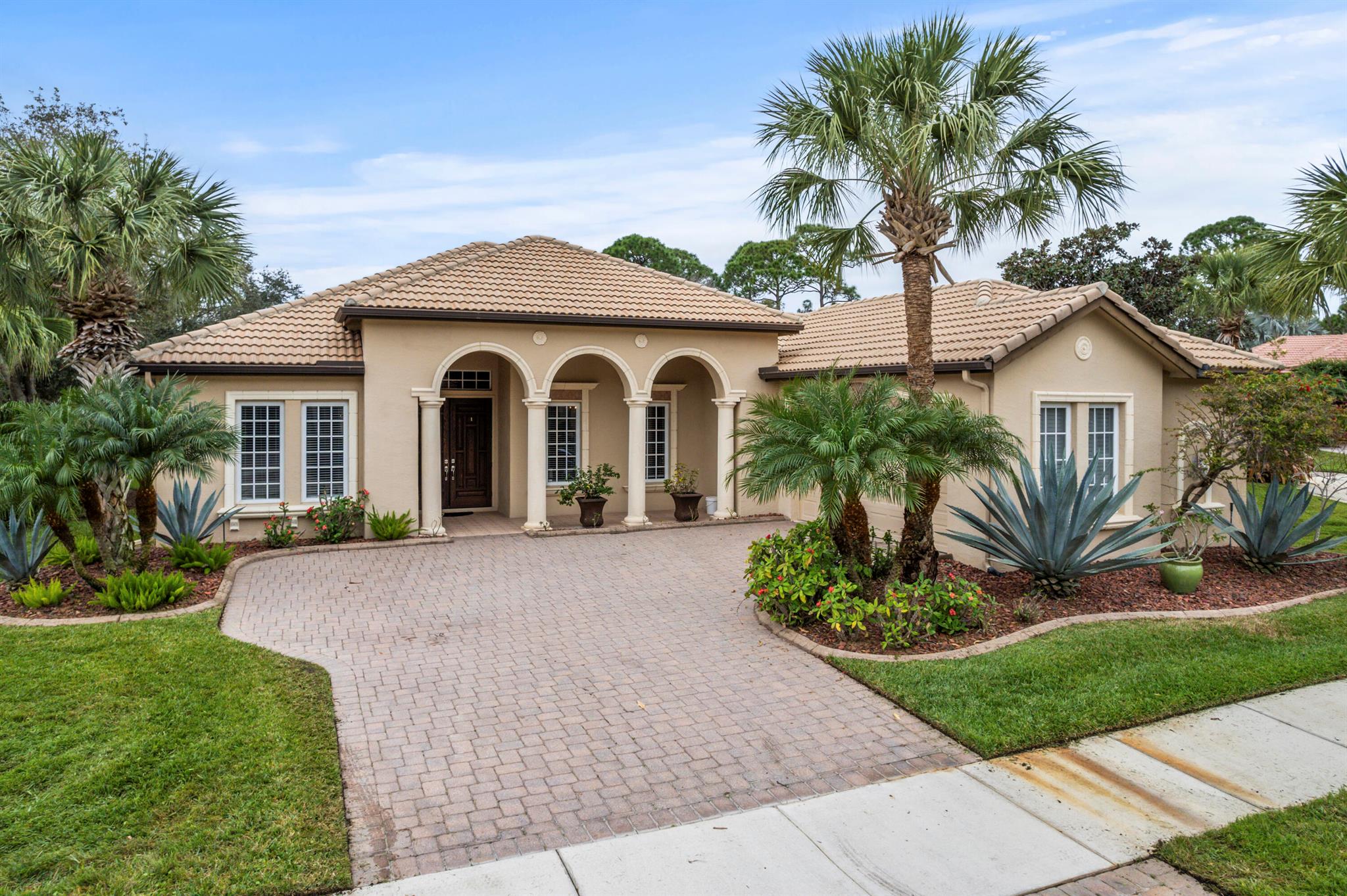 Absolute Stunner of a Home at an Exceptional Value! This 3BR 3BA Home, Located in the Beautiful Vineyards Community is Priced to Sell! Home features Open Concept, Ceramic Tile Throughout, Granite Gourmet Kitchen with Island and 42'' Cabinets. Upgrades, such as Crown Molding and Impact Windows! Large Screened Patio on a Corner Lot, Wonderful Location with Easy access to I-95, Shopping and Dining. An Absolute Must See!