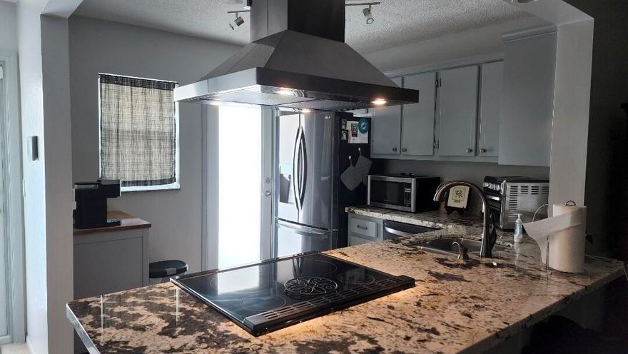 Welcome to the nicest unit for rent in all Village Royal (55+ Adult Community). Unit can be rented annually (furnished or unfurnished) or as a 3-4 month seasonal rental now available. This super clean and beautifully updated corner unit has an open kitchen with granite counters and LG appliances, gorgeous updated baths, peaceful patio, and full size stackable front load washer & dryer. Community pool and game room steps from the unit and water, basic cable & internet/Wi-Fi is included. Come make this wonderful unit your perfect place to call home.