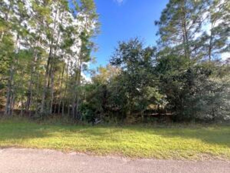Half acre lot located in tranquil community of Indian Lake Estates, Polk County Florida, Gated comunity offers large lake with 1000 ft. pier,  marina, boat launch, 18 hole golf course, clubhouse, cafe, ballroom, fitness room, billiards, library, basketball, tennis, picnic area and playground. Buy and build or hold for investment.