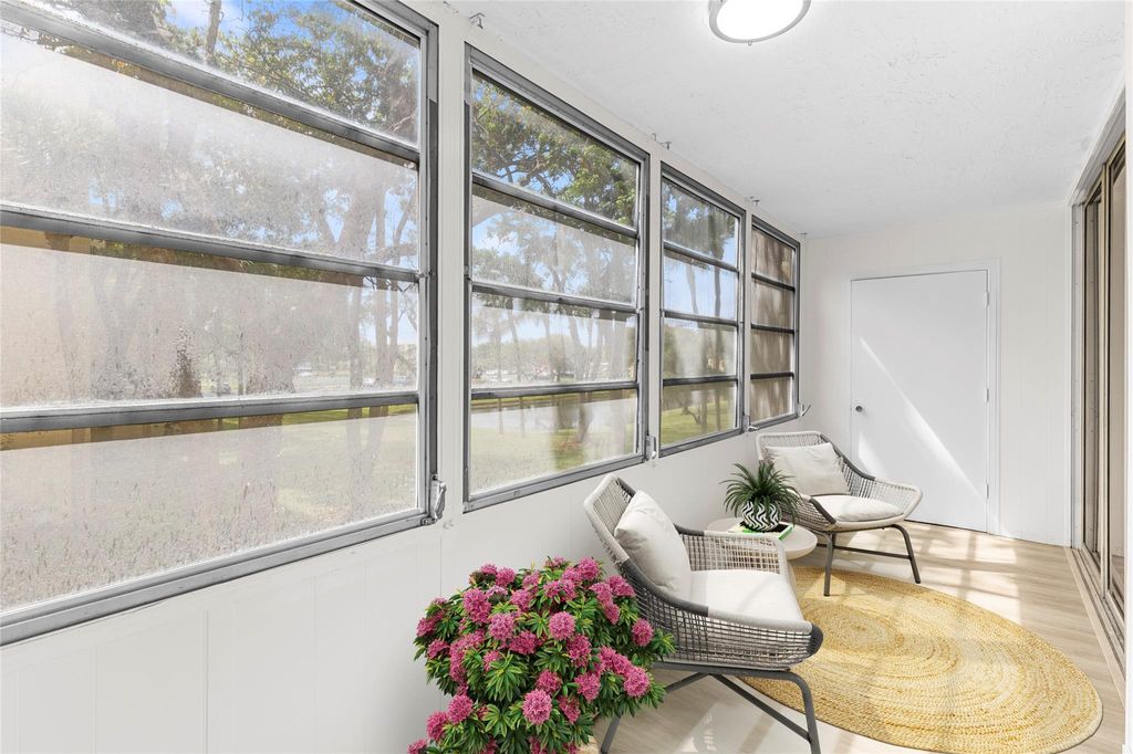 Photo of 3341 NW 47th Terrace #210, Lauderdale Lakes, FL 33319 (MLS # F10556559)