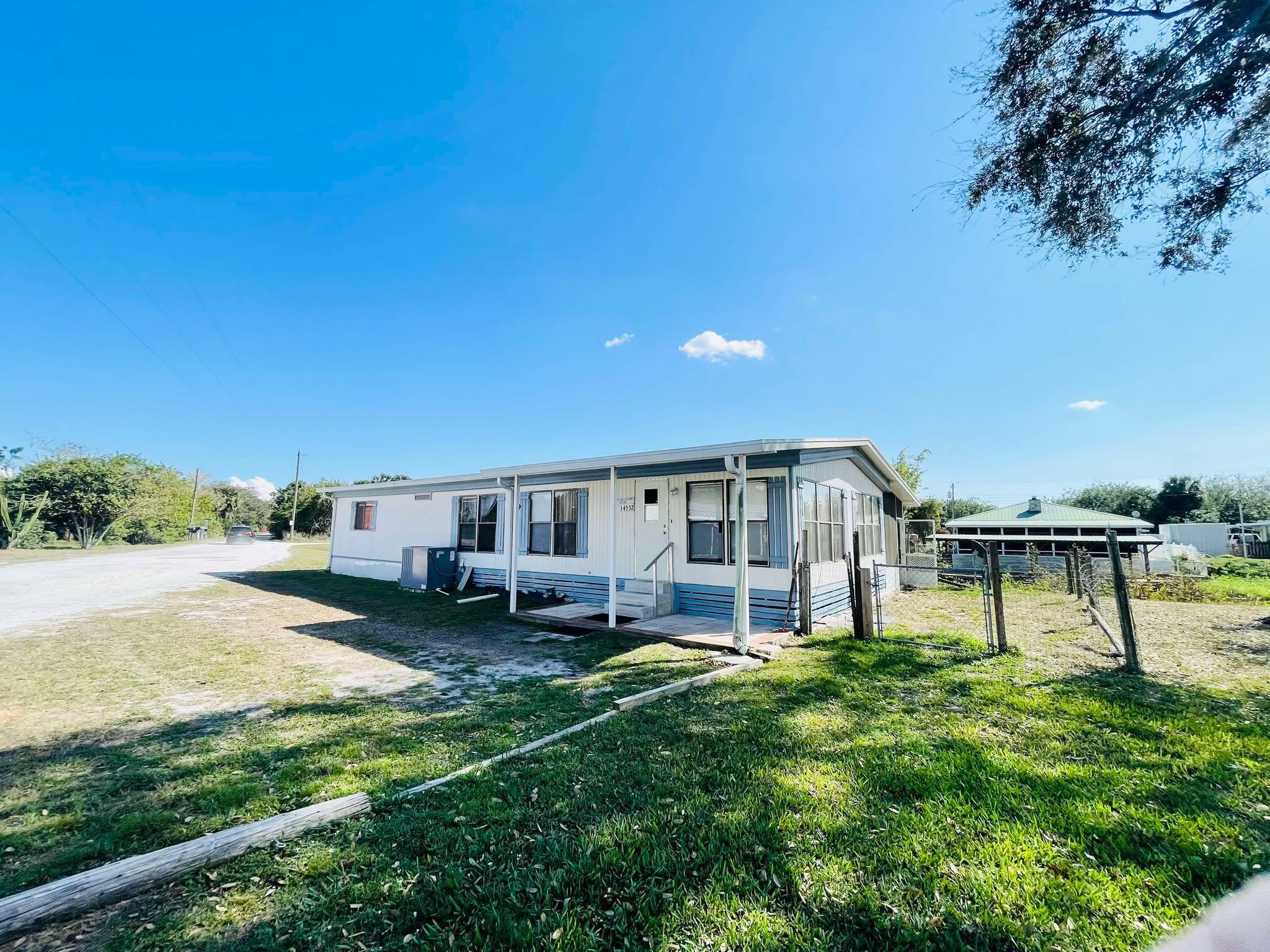 Discover the perfect lakeside retreat! This spacious 2-bedroom, 2-bath manufactured home features an open-concept design with two inviting living rooms, offering plenty of room to relax and entertain. Enjoy direct lake access to Lake Okeechobee, a paradise for fishing enthusiasts and outdoor lovers alike.Whether you're looking for a peaceful getaway or a full-time residence, this home provides the ideal blend of comfort and convenience.