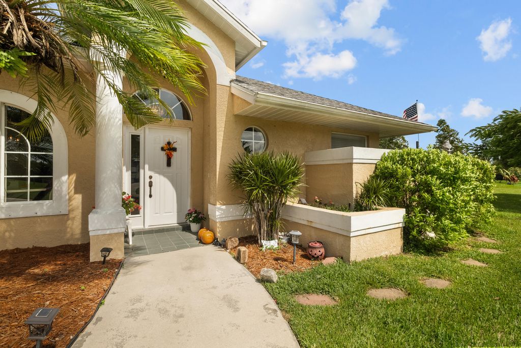 Photo of 2055 SW Aaron Lane, Port Saint Lucie, FL 34953 (MLS # R10925154)