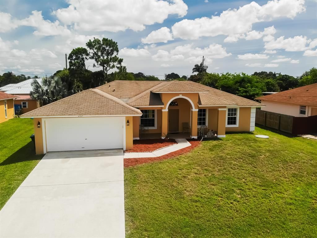 Photo of 777 SW Parker Avenue Ave, Port Saint Lucie, FL 34953 (MLS # R10810729)