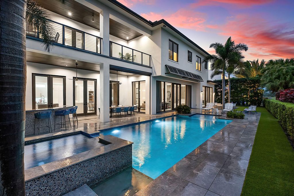 Photo of 1576 Thatch Palm Drive, Boca Raton, FL 33432 (MLS # R10944561)