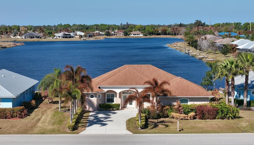 Beautiful 2015 3BR/3BTH + office/extended 2 car garage in highly sought after Cross Creek Lake Estates. An Enclave of Beautiful Unique Homes! This home has a heated Pool & SPA with panoramic waterfront views of Crystal Lake, a spectacular 44 acres lake. Open & Light Floor Plan Flows Seamlessly to the Pool & Screened Lanai. Full Glass double front door, high ceilings w/crown molding. Large Kitchen, double wall ovens, granite countertops & SS appliances. Large owner's suite w/water views & access to your private oasis. Great Location minutes from the River and the Beach.