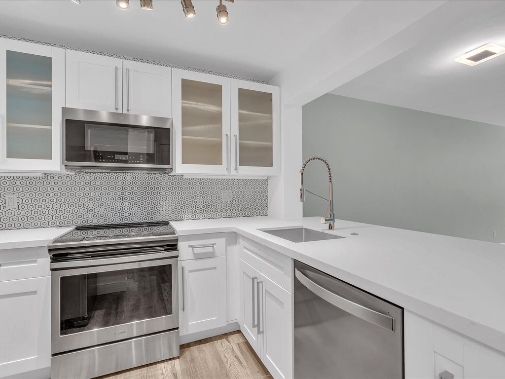 Photo of 4025 N Federal Highway N #215a, Oakland Park, FL 33308 (MLS # B26025435)