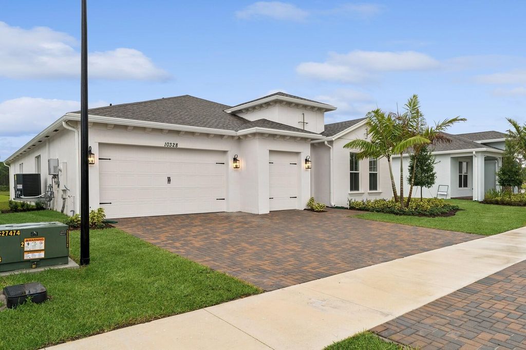 Photo of 10328 Field Flower Trail NW #187, Port Saint Lucie, FL 34987 (MLS # R11125460)