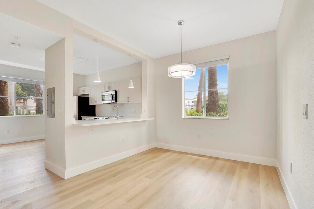 Photo of 11037 Legacy Boulevard #104, Palm Beach Gardens, FL 33410 (MLS # R11088181)