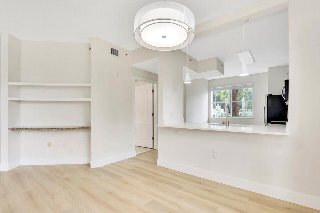 Photo of 11037 Legacy Boulevard #104, Palm Beach Gardens, FL 33410 (MLS # R11088181)