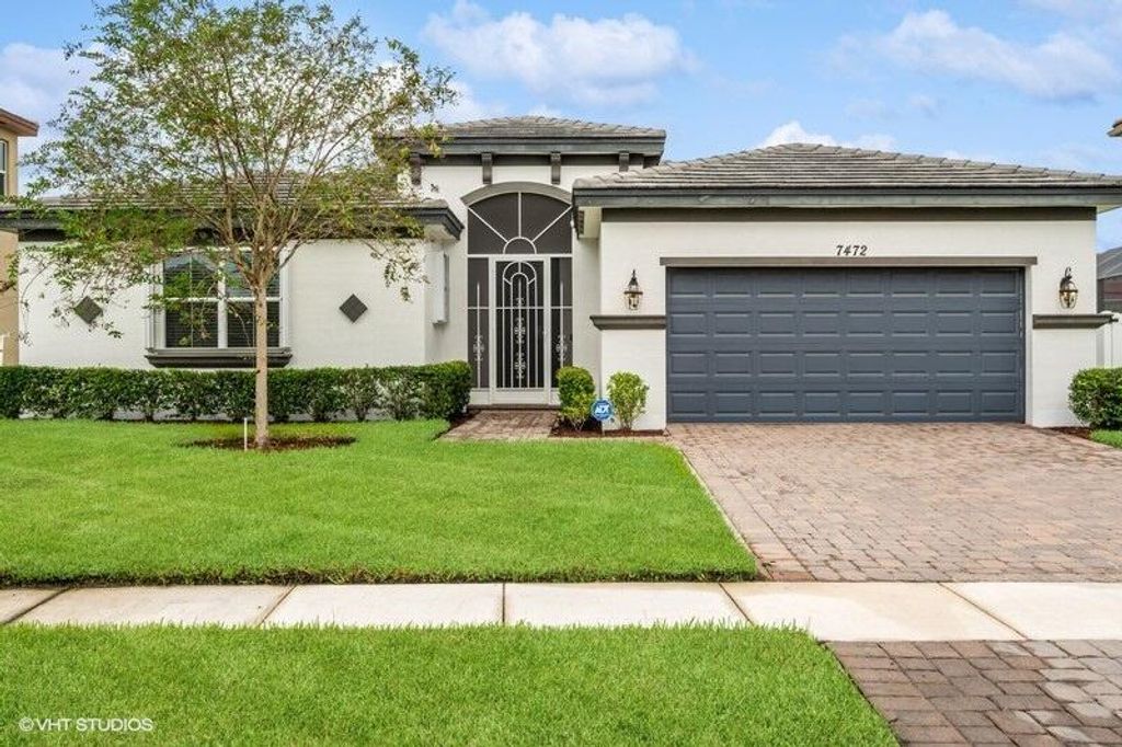 Photo of 7472 NW Greenspring Street, Port St Lucie, FL 34987 (MLS # R10926824)