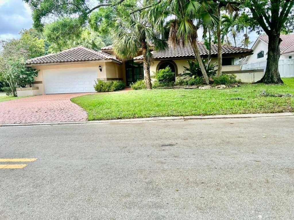 Photo of 5048 NW 98th Lane, Coral Springs, FL 33076 (MLS # B26013293)