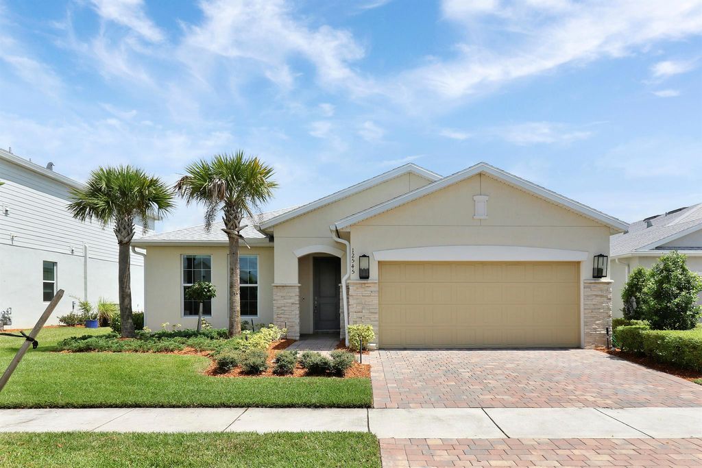 Photo of 12545 SW Gray Fox Lane, Port Saint Lucie, FL 34987 (MLS # R11021592)