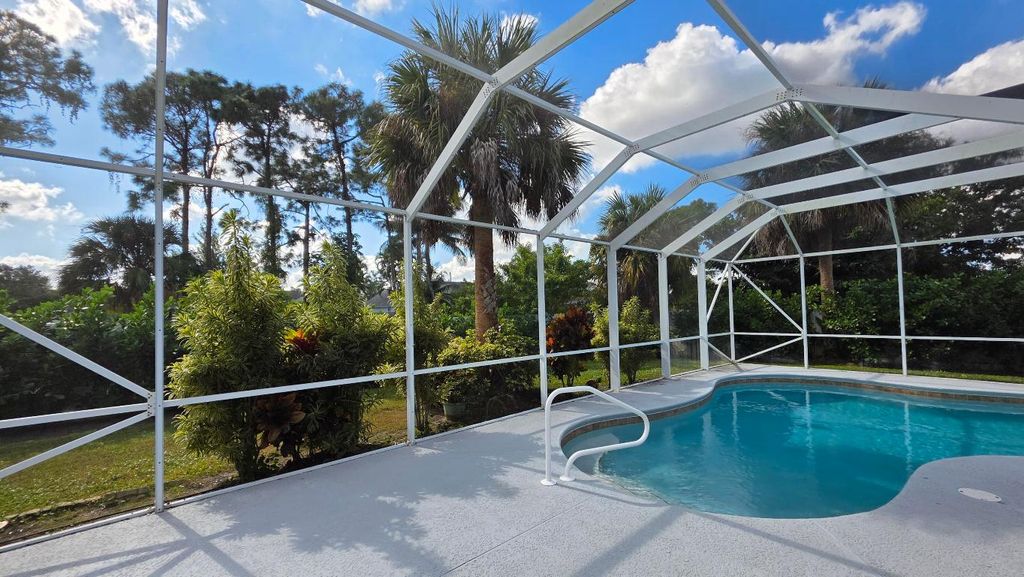 Photo of 668 SE Walters Terrace, Port Saint Lucie, FL 34983 (MLS # R11137266)