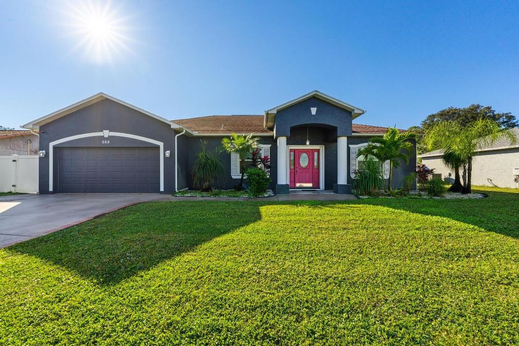 Photo of 668 SE Walters Terrace, Port Saint Lucie, FL 34983 (MLS # R11137266)