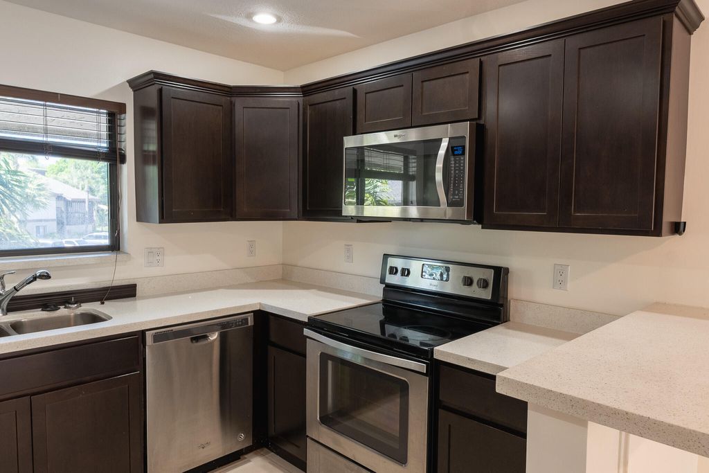Photo of 1665 Cabot Lane #A3, Wellington, FL 33414 (MLS # B26027522)