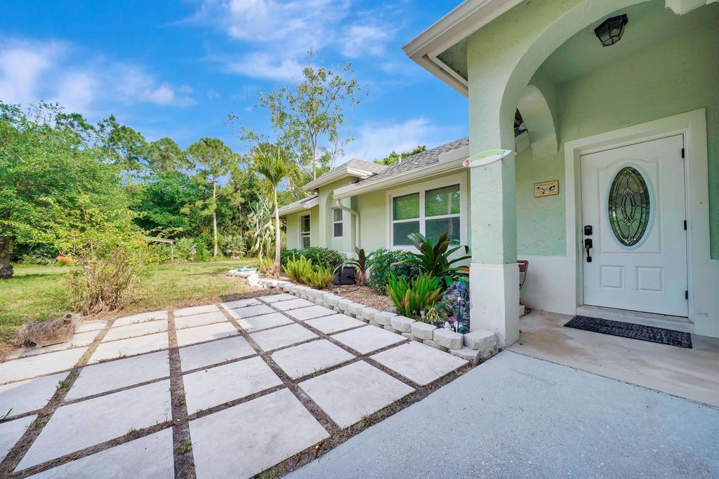 Photo of 18356 46th Court N, The Acreage, FL 33470 (MLS # R10975044)