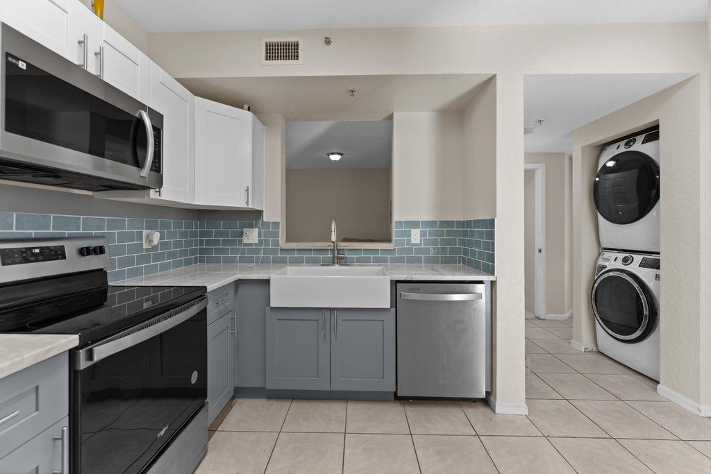 Photo of 1165 Golden Lakes Boulevard #1212, West Palm Beach, FL 33411 (MLS # B26067634)