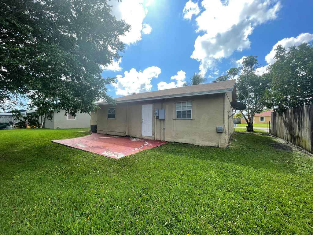 Photo of 8151 SW 6th Street, North Lauderdale, FL 33068 (MLS # B26012625)