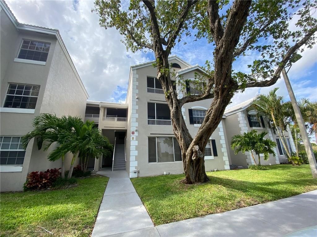 Photo of 2841 N Oakland Forest Drive #107, Oakland Park, FL 33309 (MLS # B26028116)